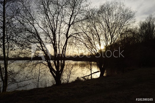 Picture of Sonnenuntergang am See im Winter Sunset at the lake in winter